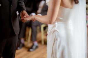 Exchange of wedding rings during a micro wedding ceremony