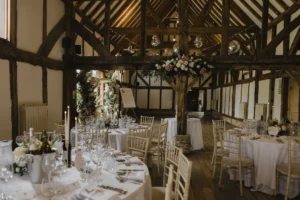 Loseley Park wedding reception with rustic décor and floral accents