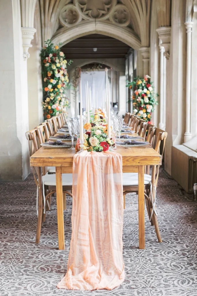 Grand dining table set with elegant candles and floral centerpieces at Nutfield Priory.