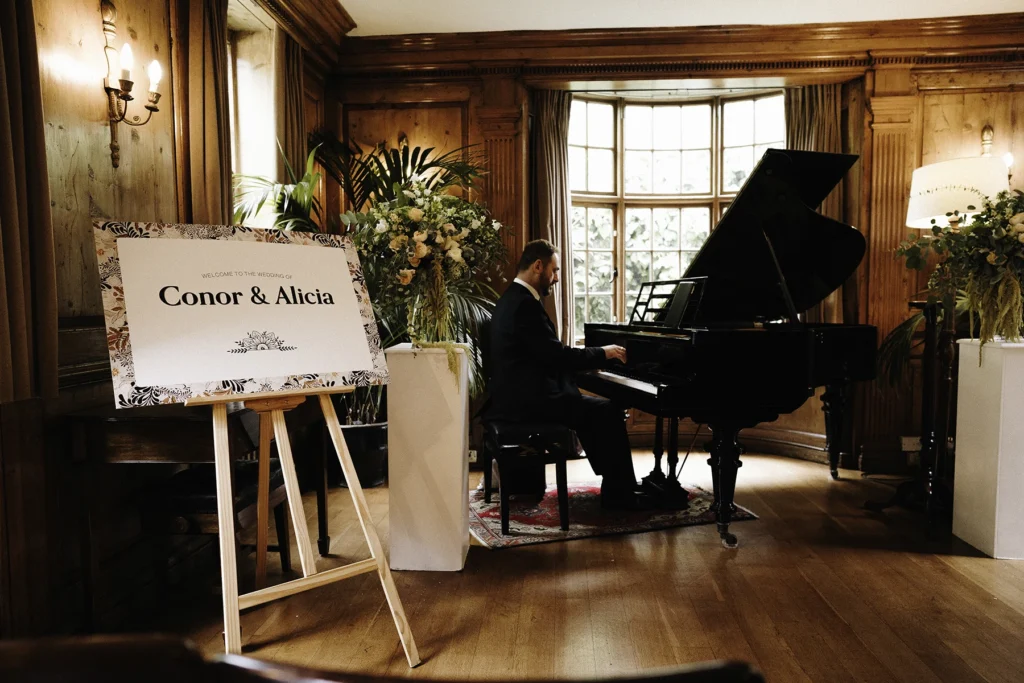 Grand Piano Setup and Welcome Sign