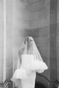 Bride in a modern gown with a tulle veil