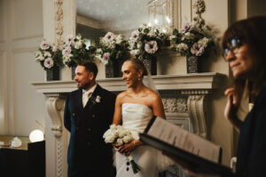 Bride and groom standing at the altar