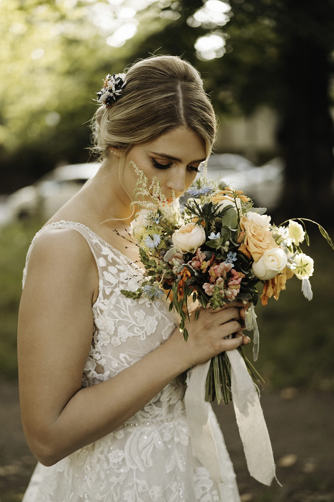 Bride admiring her floral bouquet