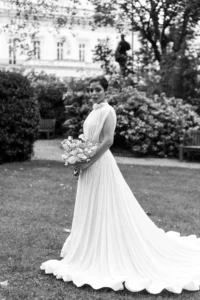 Black and white portrait of an elegant bride in a flowing gown