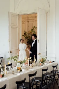 Bride and groom entering their elegant wedding reception