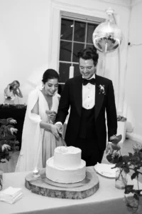 Bride and groom cutting their elegant wedding cake