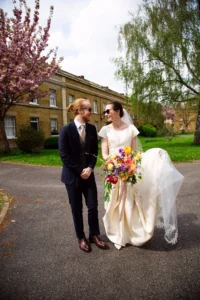 Bride and groom walking joyfully after their wedding