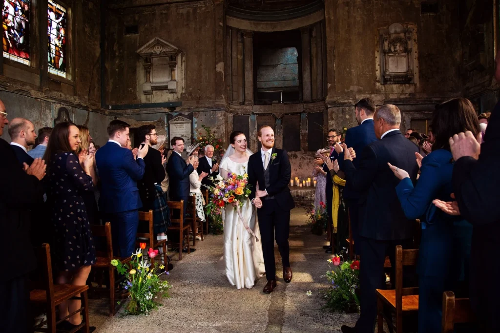 Newlyweds walk down the aisle