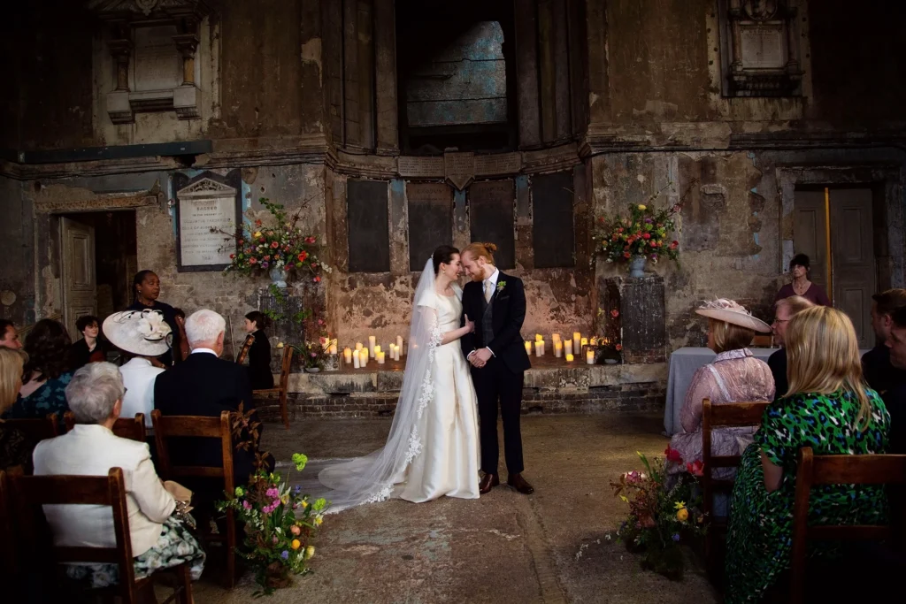 Bride and groom standing at the altar