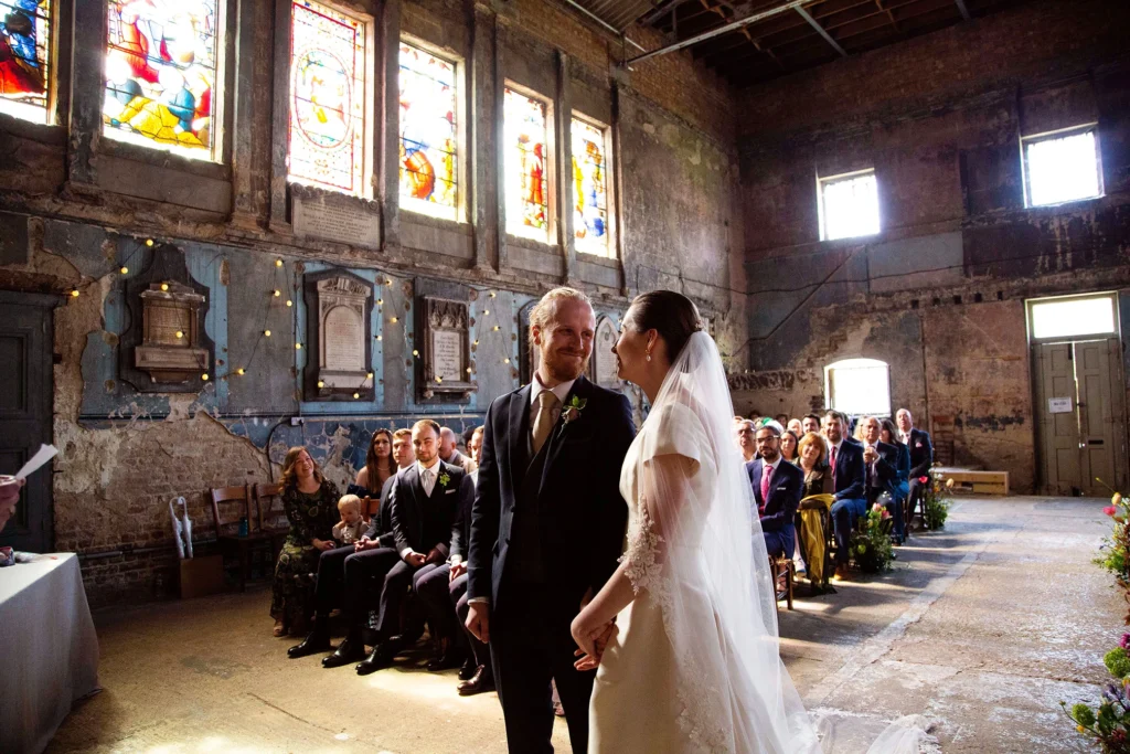 Newlyweds Share a Loving Moment Inside Asylum Chapel