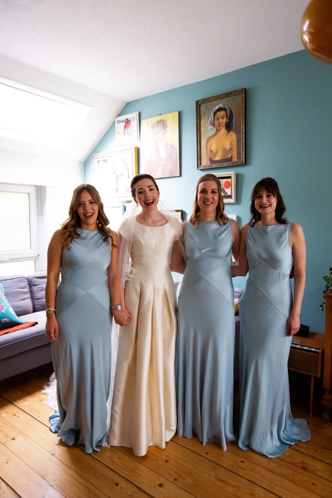 Bride with Bridesmaids in Pastel Blue Dresses