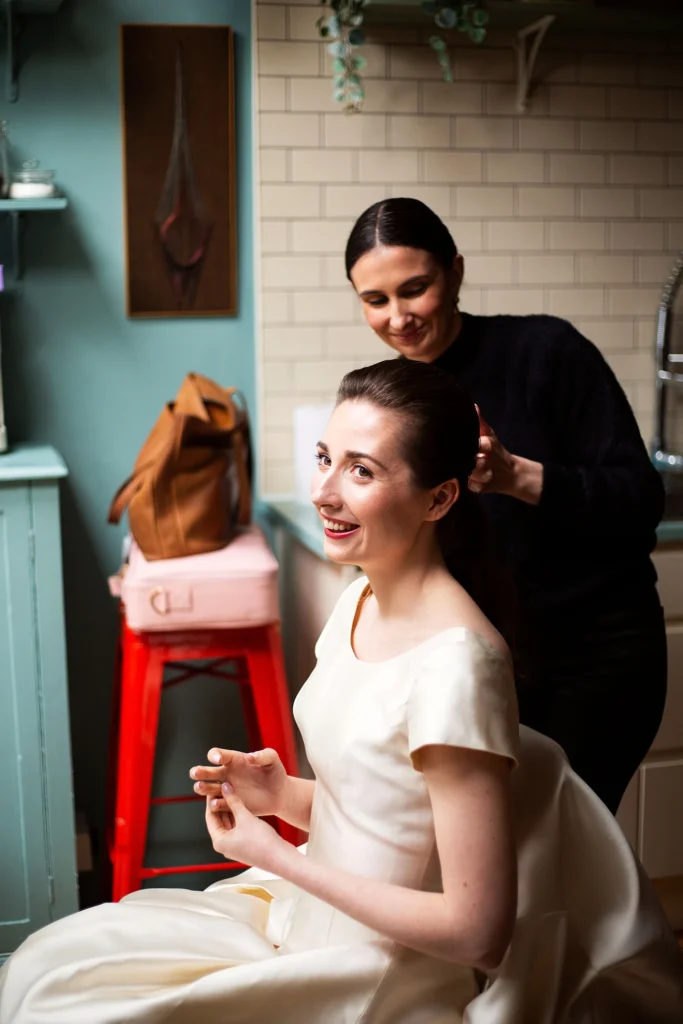 Bride Smiling During Hair Styling