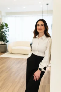 Owner of award-winning hair salon in Angel Islington standing confidently