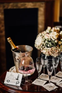 Elegant champagne and chocolate strawberries setup for a luxury wedding