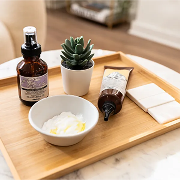 Luxury hair and scalp treatment products used during trichology consultations at Izabella Bordignon London.