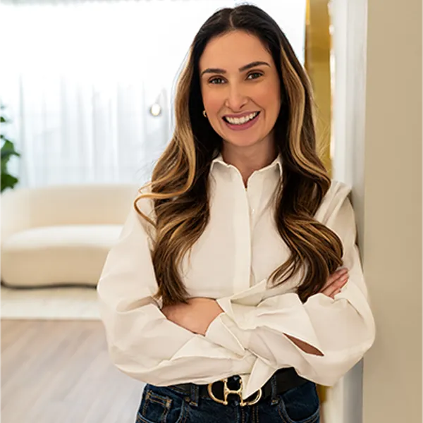 Izabella Bordignon Certified trichologist in London smiling, ready to welcome clients.